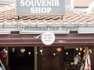Nesebur Shop sign in English
